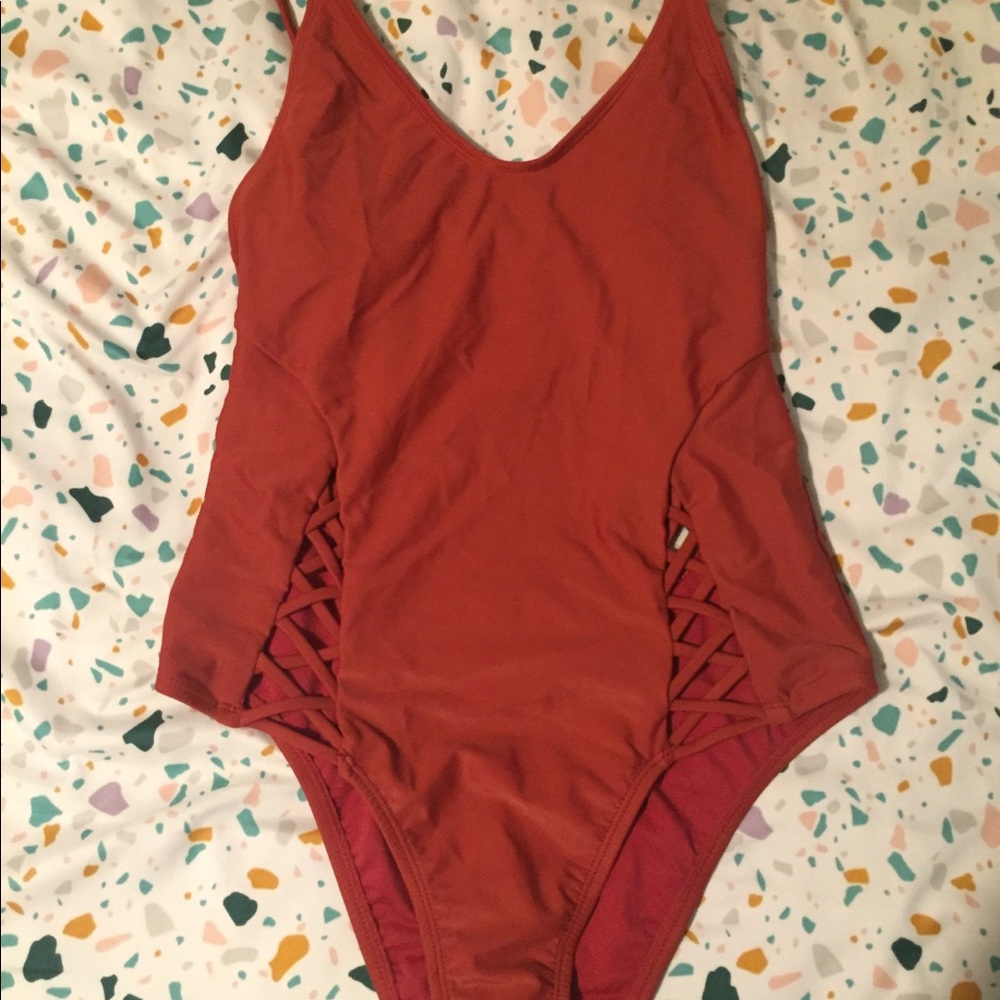 Strappy Rust colored one piece bathing suit